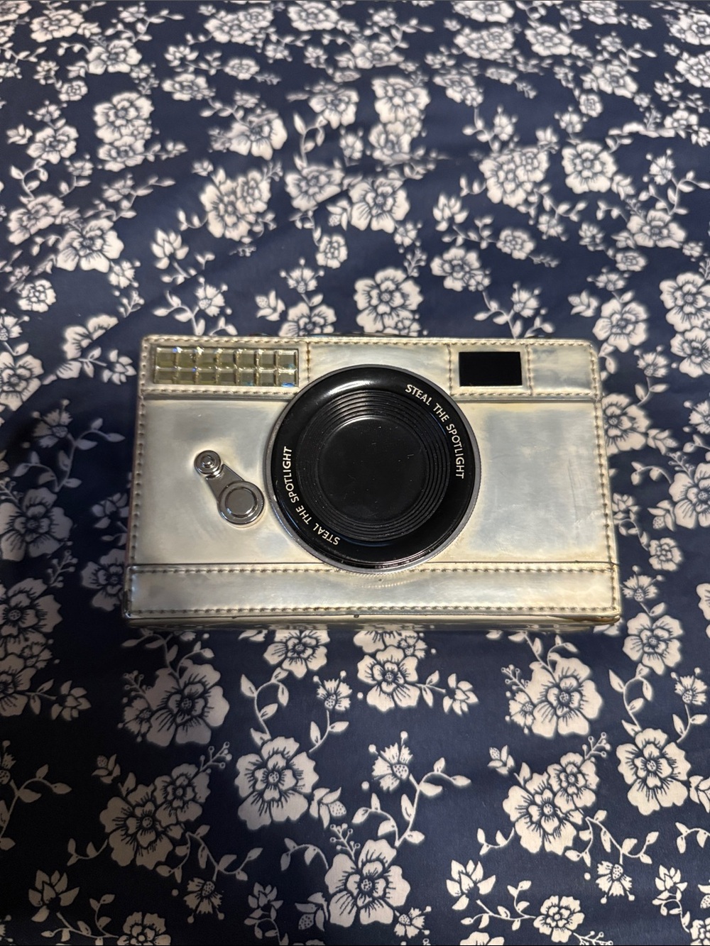 kate spade Metallic Silver Camera Clutch with Black Lens Detail